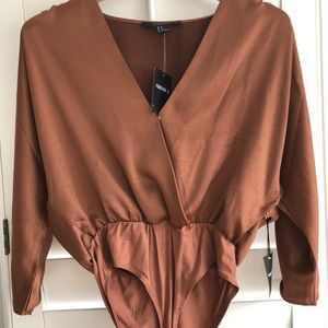 NWT Bodysuit. Faux Wrap gorgeous rust color. S.